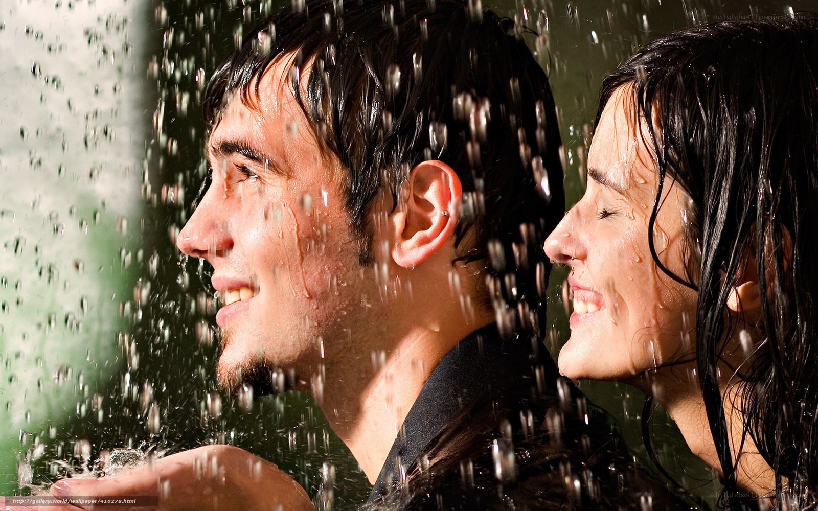 couple enjoying rain shower