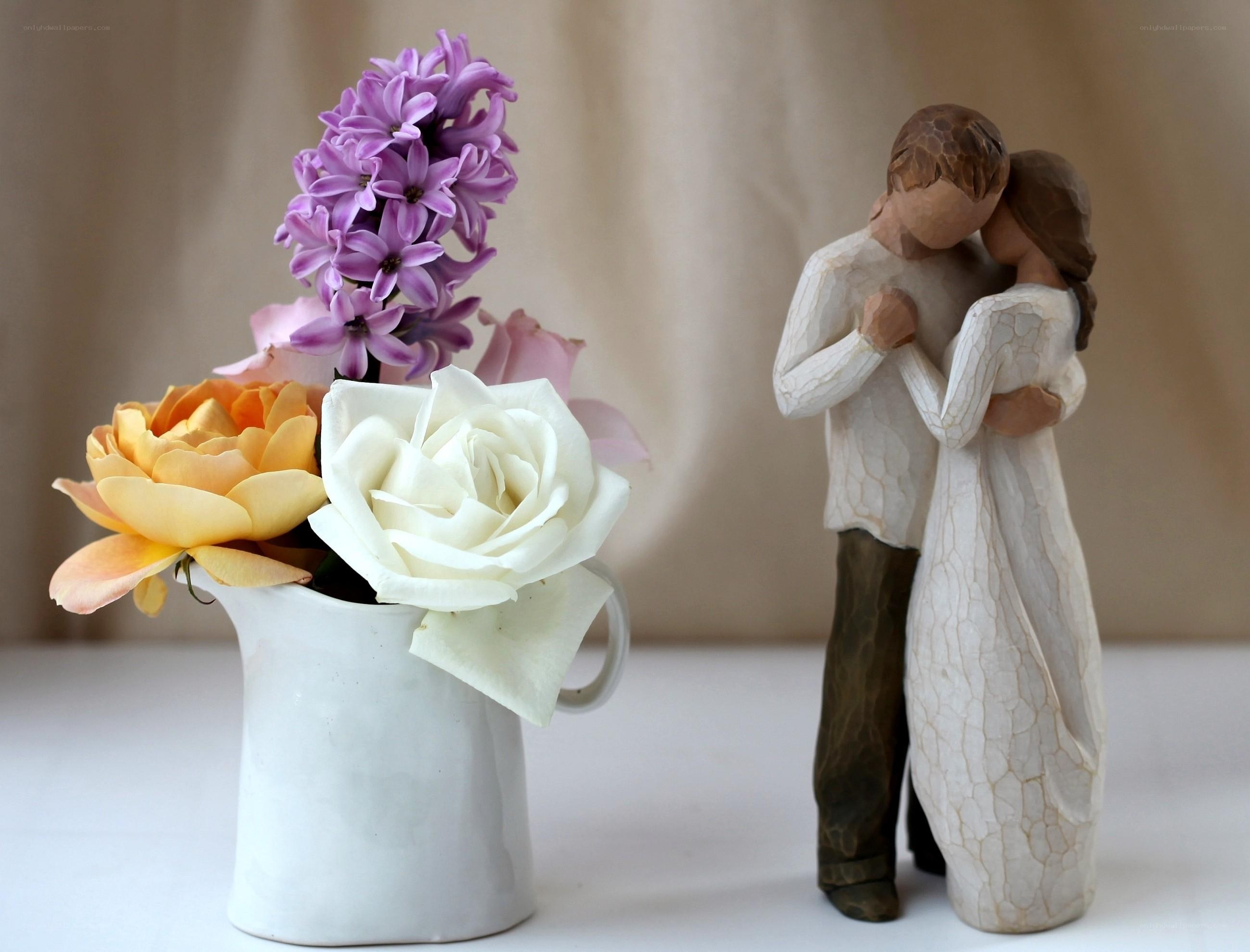 Couple figurine with flowers