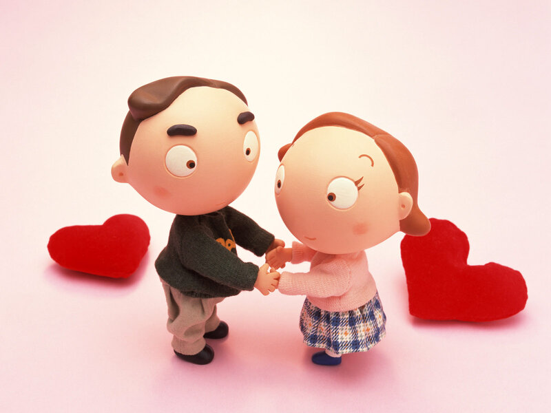 Couple Figurines Holding Hands