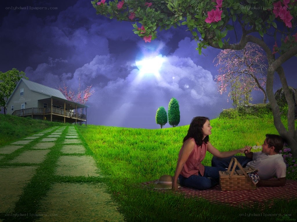 Couple having picnic at night