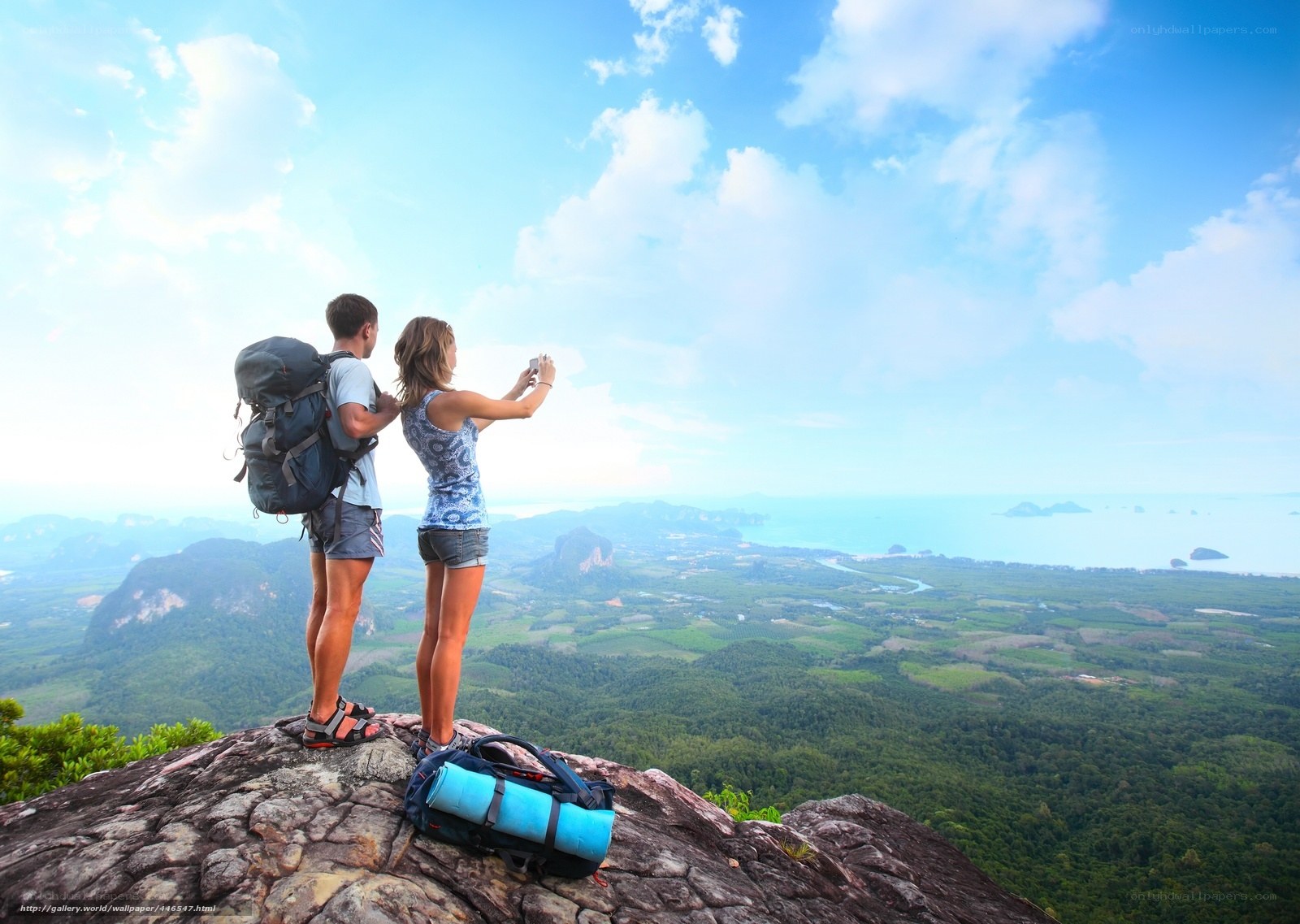 Couple hiking at mountain peak