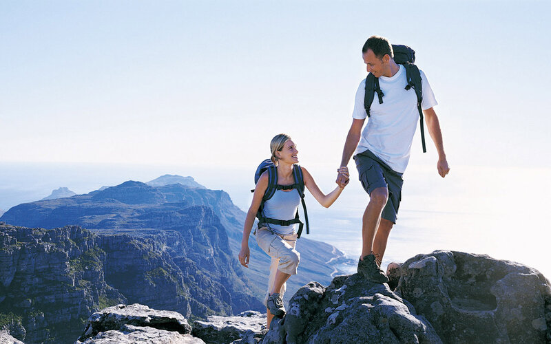 Couple Hiking on Mountain