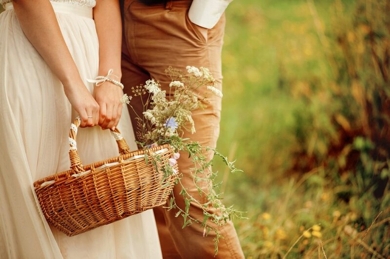 Couple Holding Basket