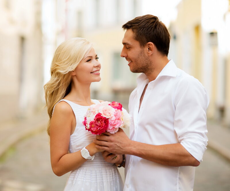Couple Holding Flowers — White, Romantic, Afternoon