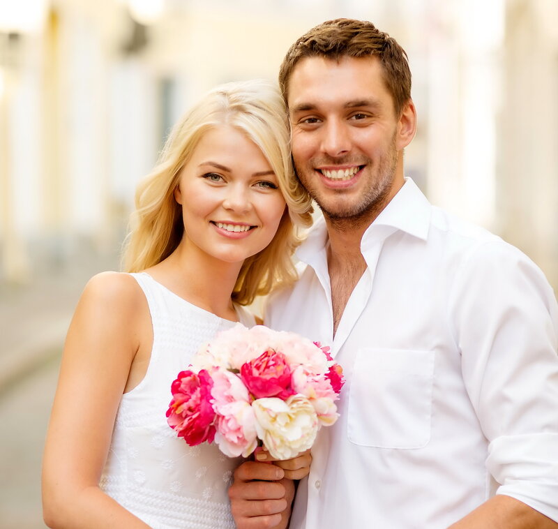 Couple Holding Flowers — White