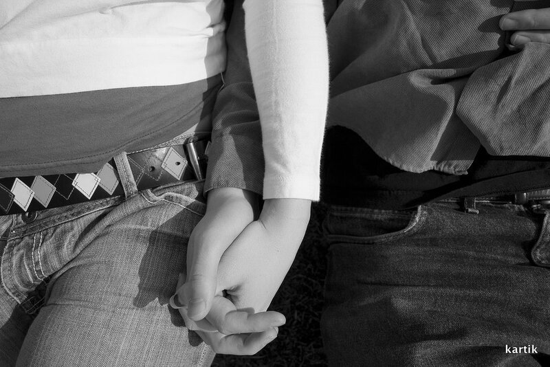 Couple holding hands