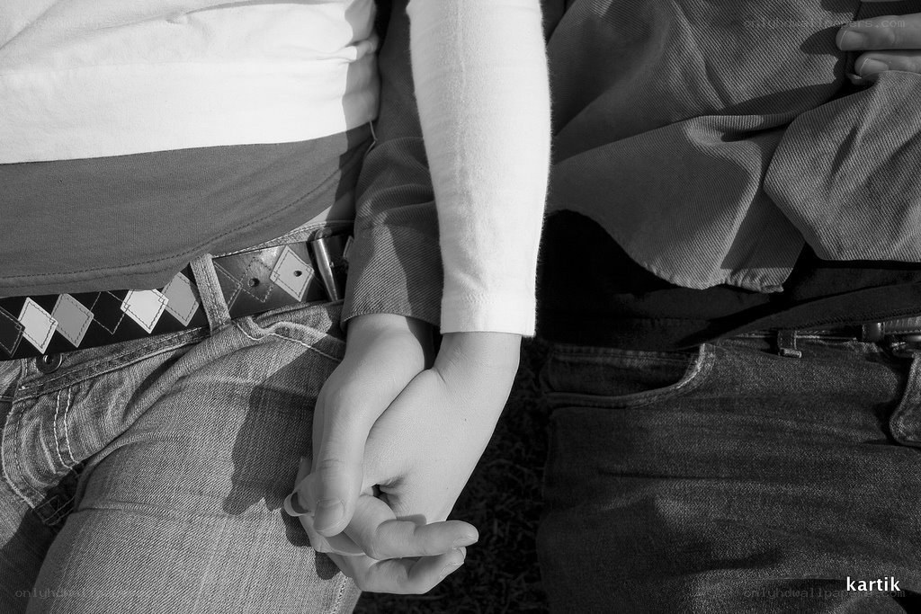 Couple holding hands
