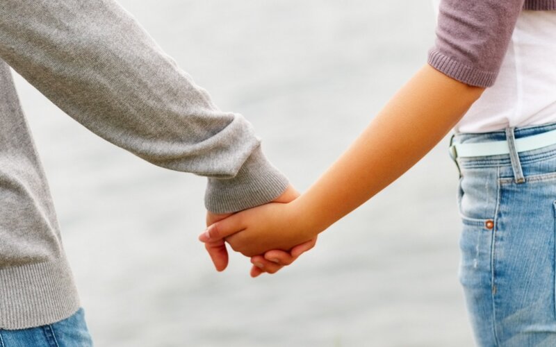 couple holding hands