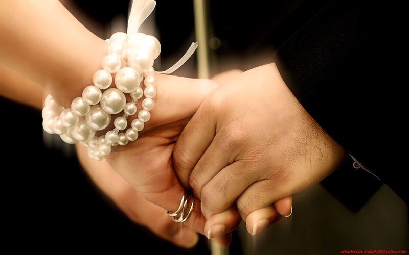 Couple holding hands
