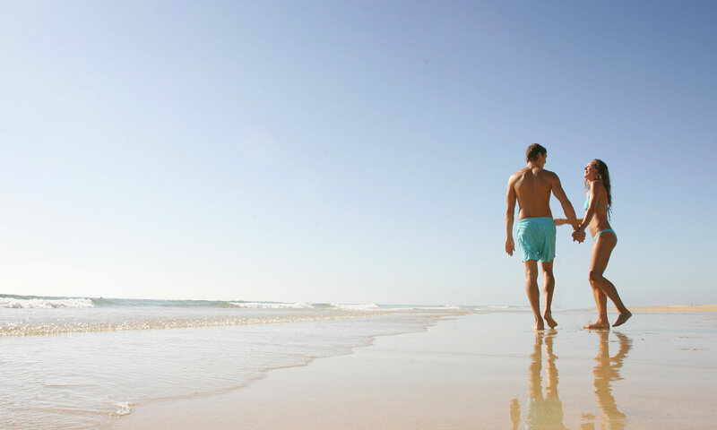 Couple Holding Hands — Blue, Serene, Afternoon, Photograph, Beach, Ocean, Sky