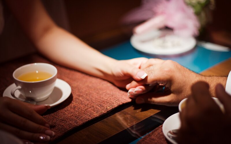 Couple Holding Hands — Brown, Intimate