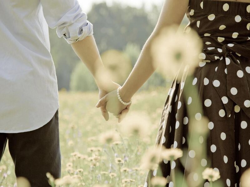 Couple Holding Hands — Brown, Serene