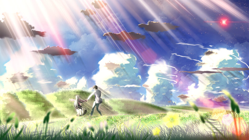 Couple holding hands in a field