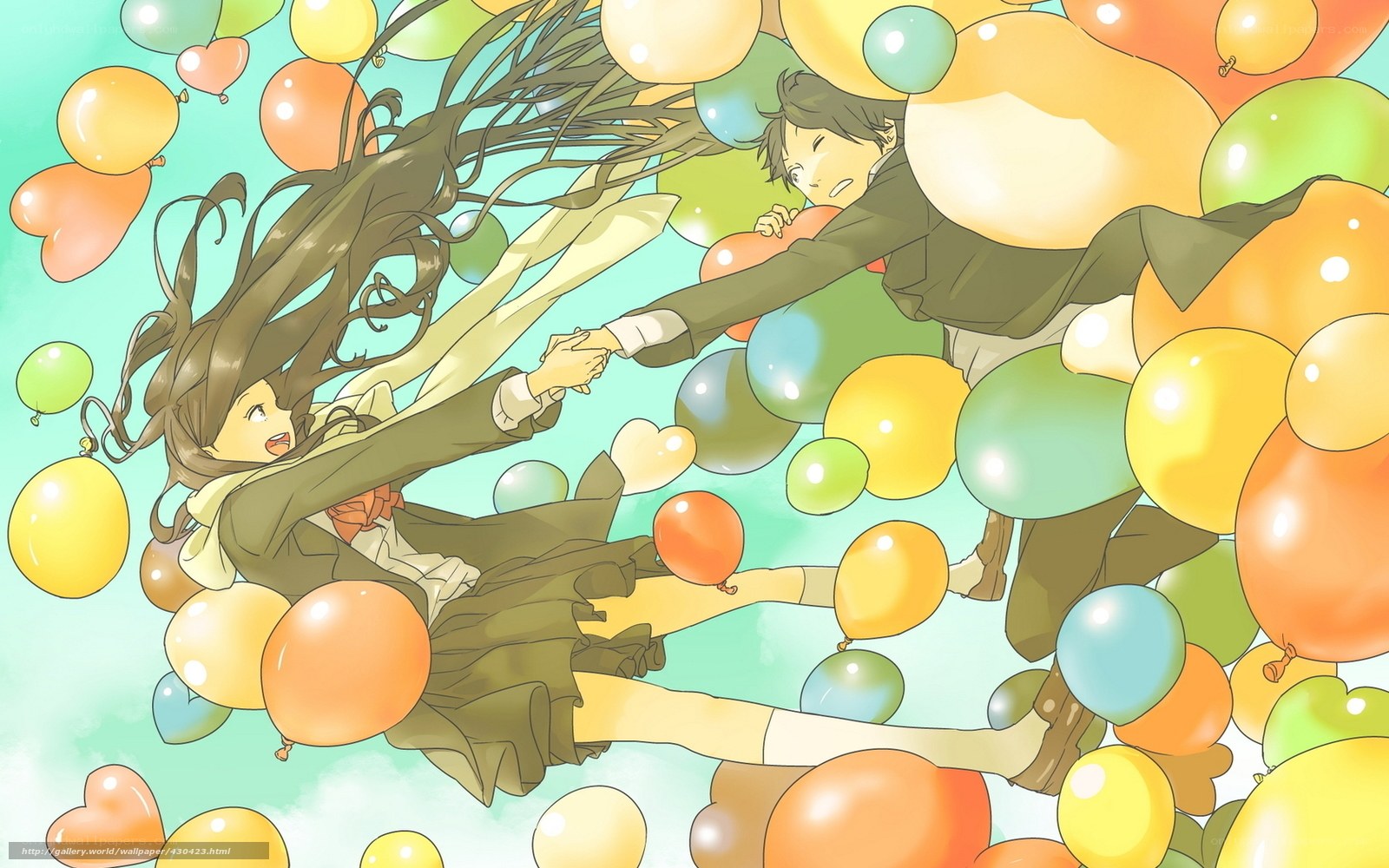 couple holding hands in balloons