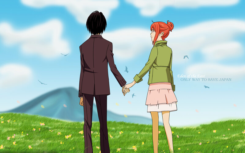 couple holding hands in field