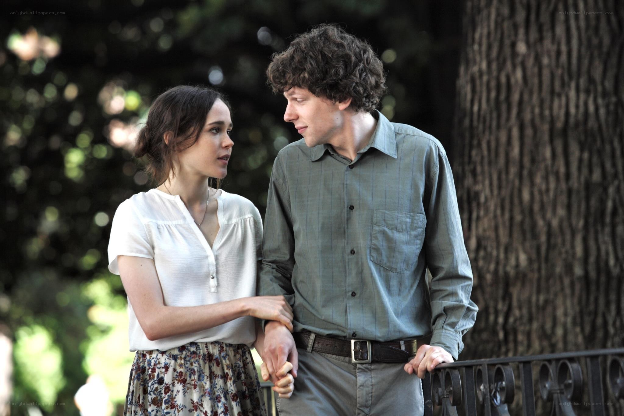 couple holding hands in park