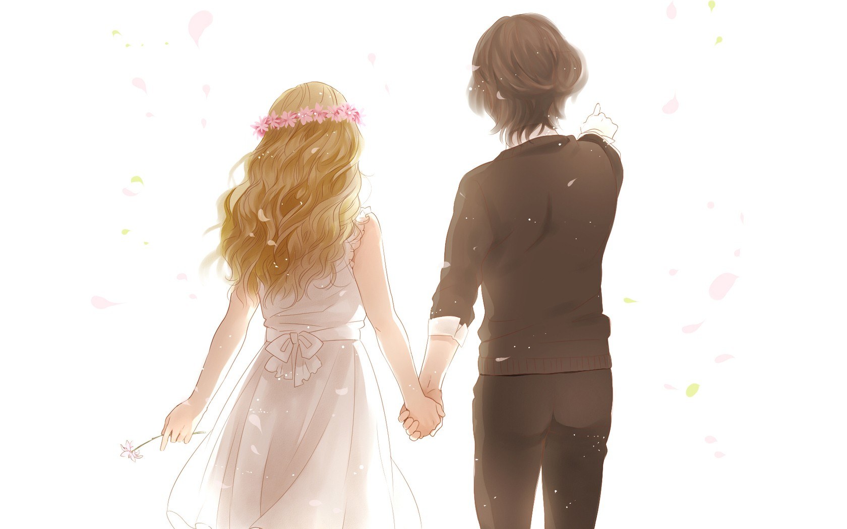 couple holding hands in spring