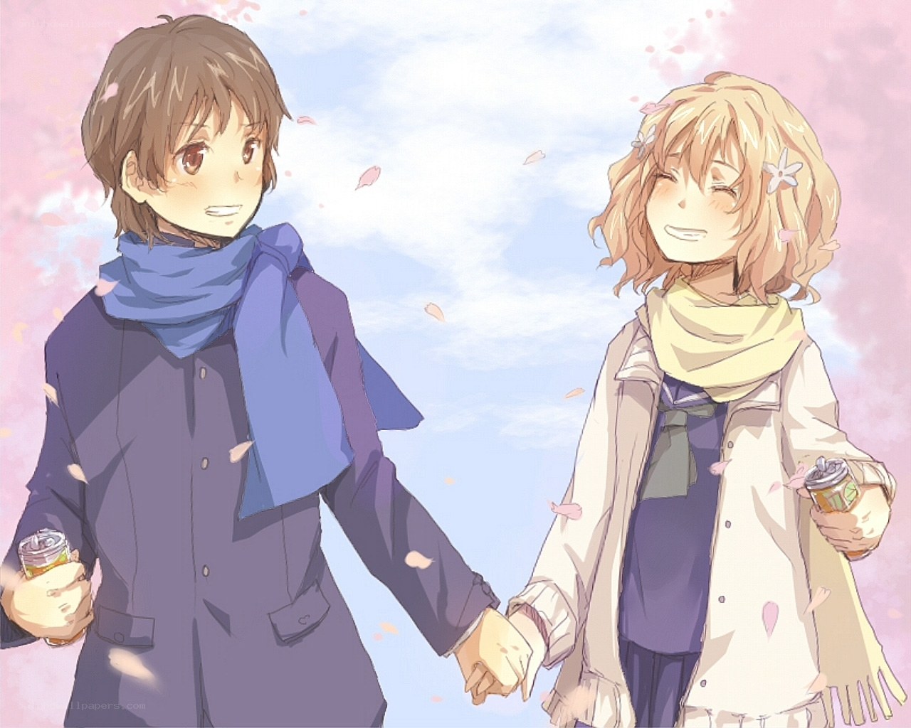 couple holding hands in spring
