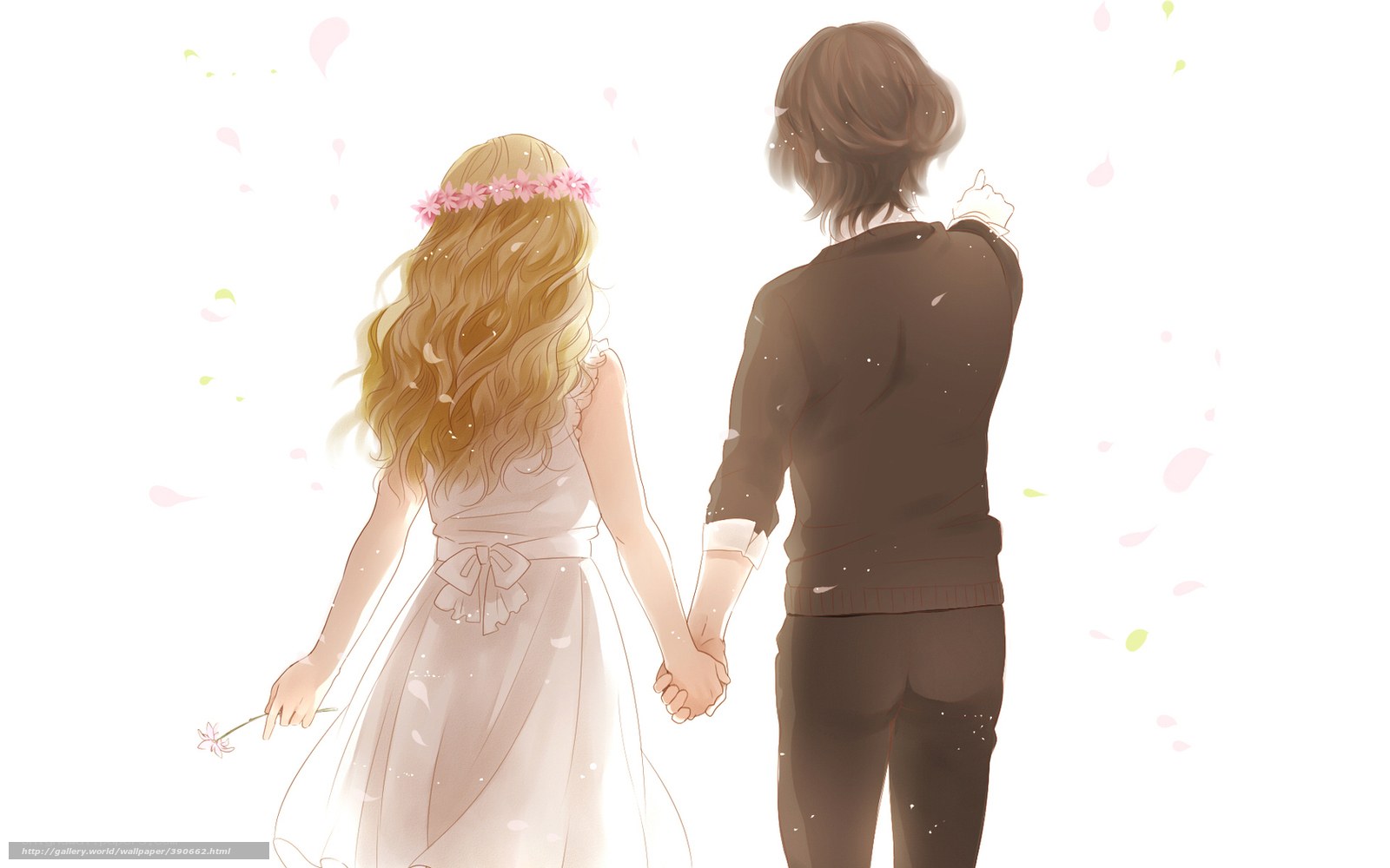 couple holding hands in sunlight