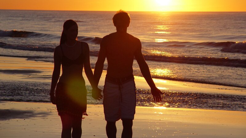 Couple Holding Hands — Orange, Serene, Sunset, Photograph