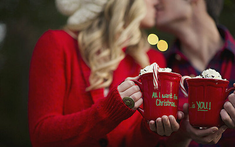 Couple Holding Mugs — Red