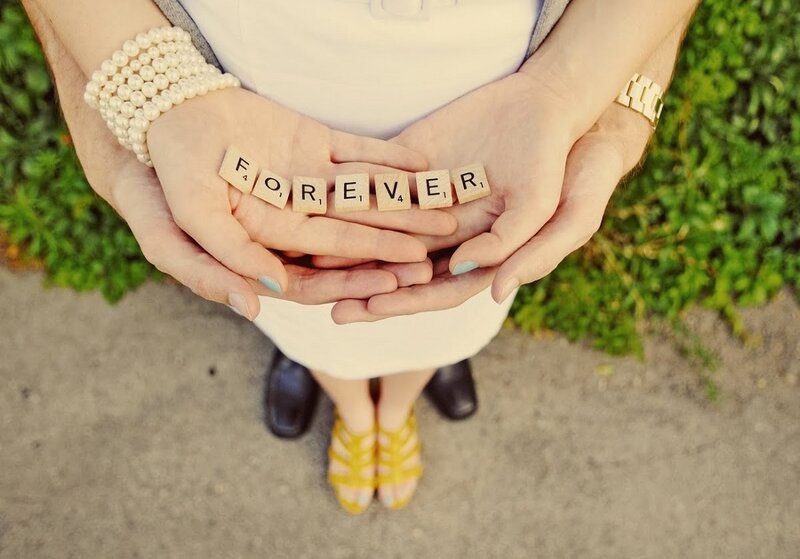 Couple Holding Scrabble Tiles