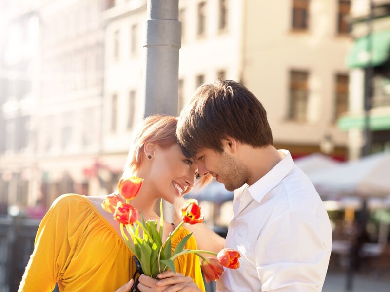 Couple Holding Tulips — Yellow