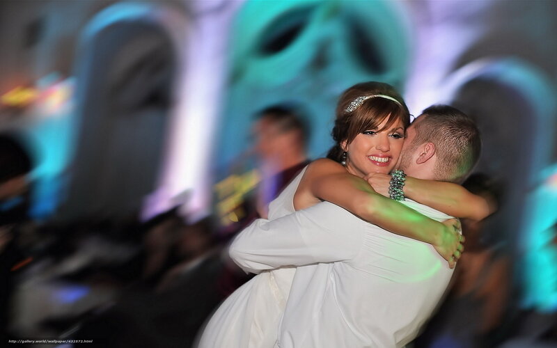 Couple hugging at wedding