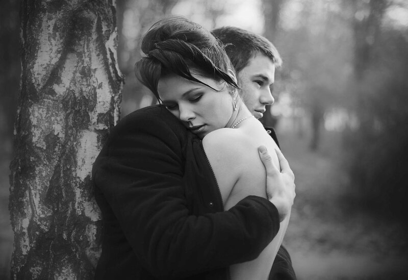 Couple Hugging by Tree — Black