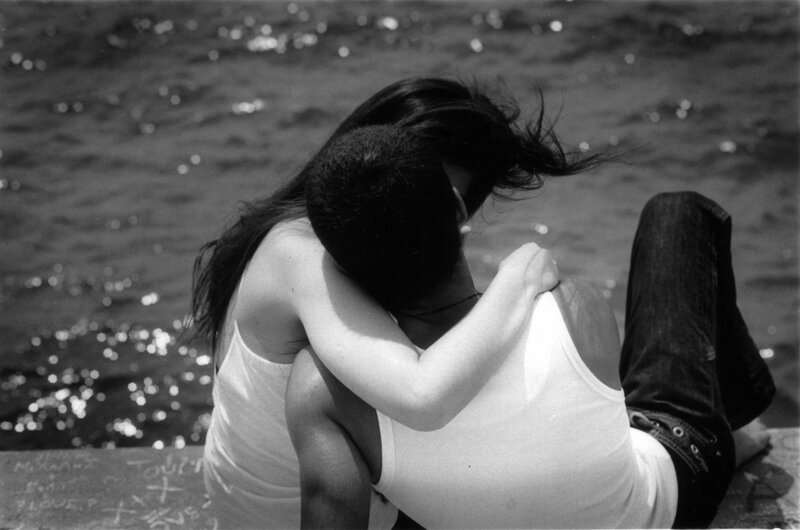 Couple Hugging by Water — Black