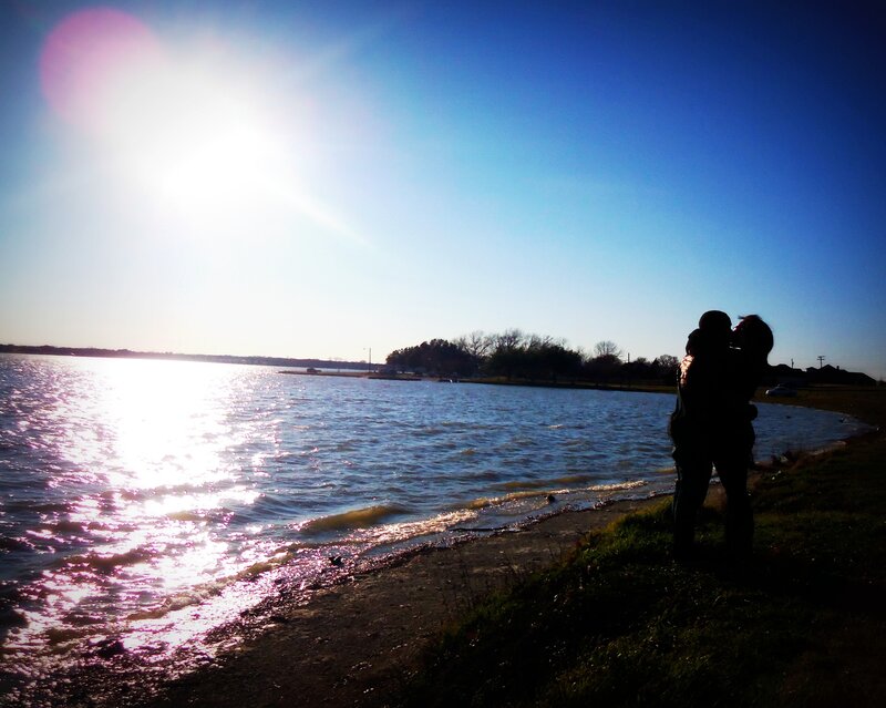 Couple Hugging by Water