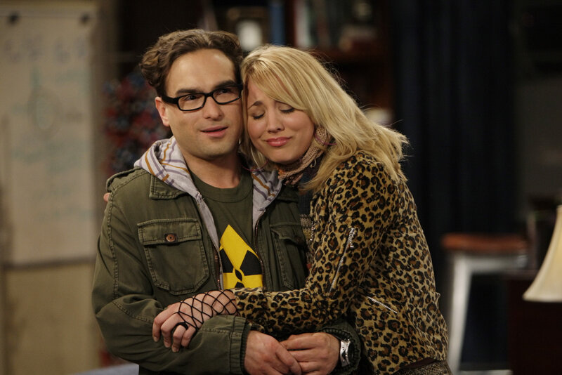 Couple hugging in a room