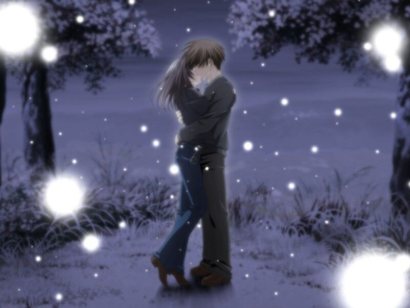 couple hugging in moonlight