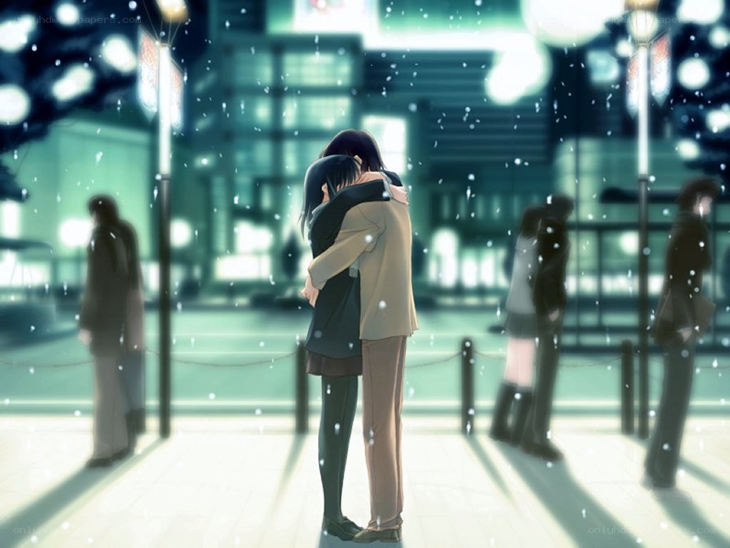 couple hugging in snow