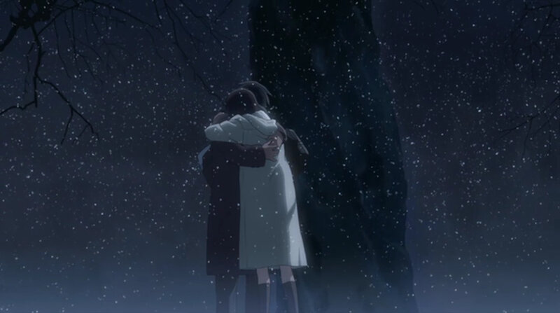 couple hugging in snow