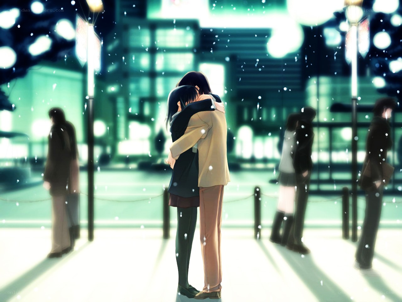 couple hugging in snow