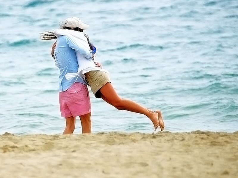 couple hugging on beach