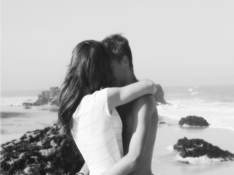 Couple Hugging on Beach — Black, Serene