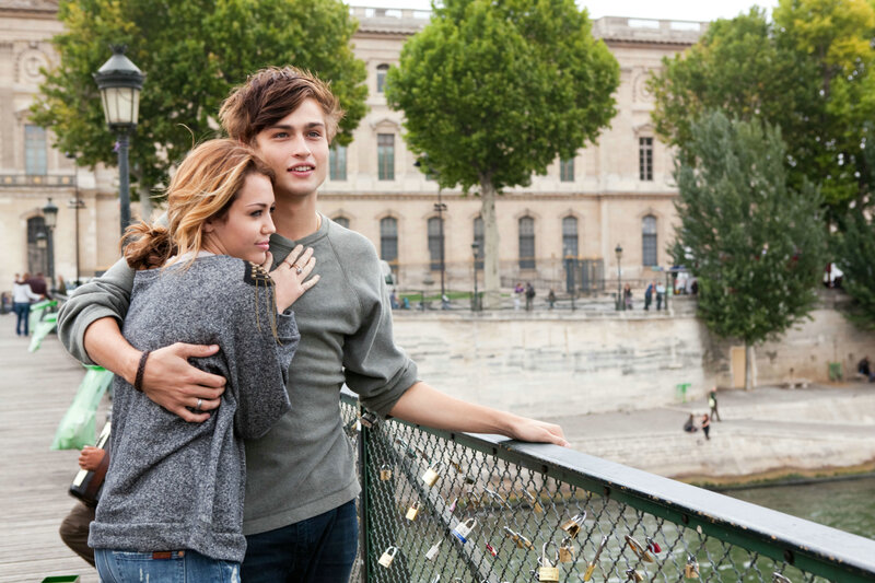 Couple Hugging on Bridge