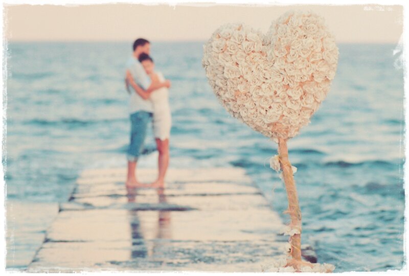 Couple Hugging on Pier