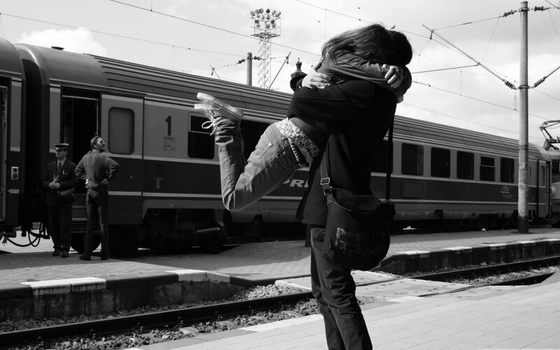 Couple Hugging on Platform