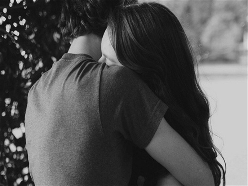 Couple Hugging Outdoors — Black, Intimate, Photograph