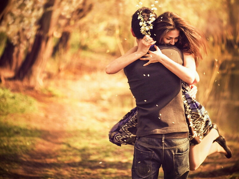 Couple Hugging Outdoors — Brown