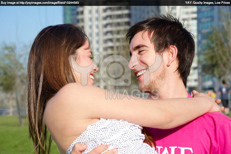 Couple Hugging Outdoors — Pink