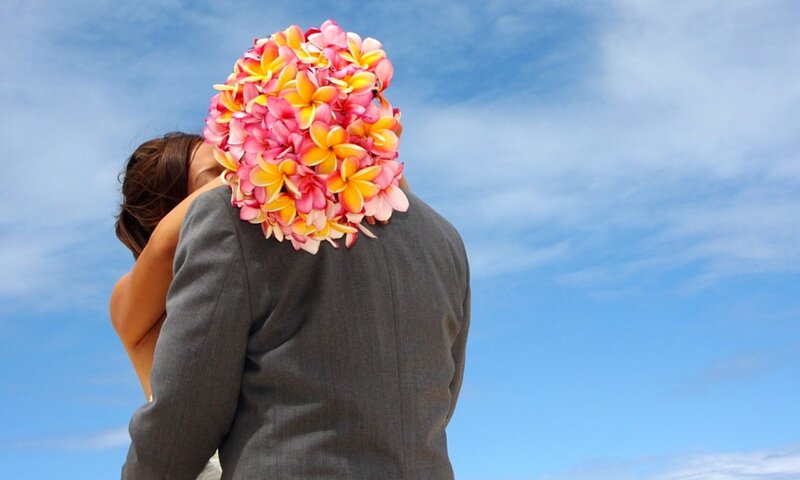 Couple Hugging with Flowers
