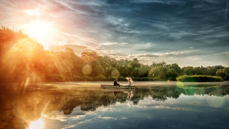 Couple in a Boat — Blue, Serene, Sunset