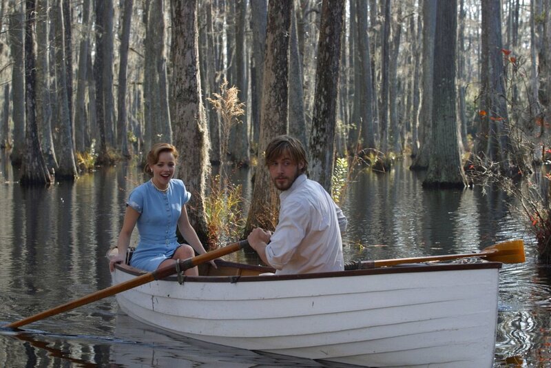 Couple in a boat on a swamp