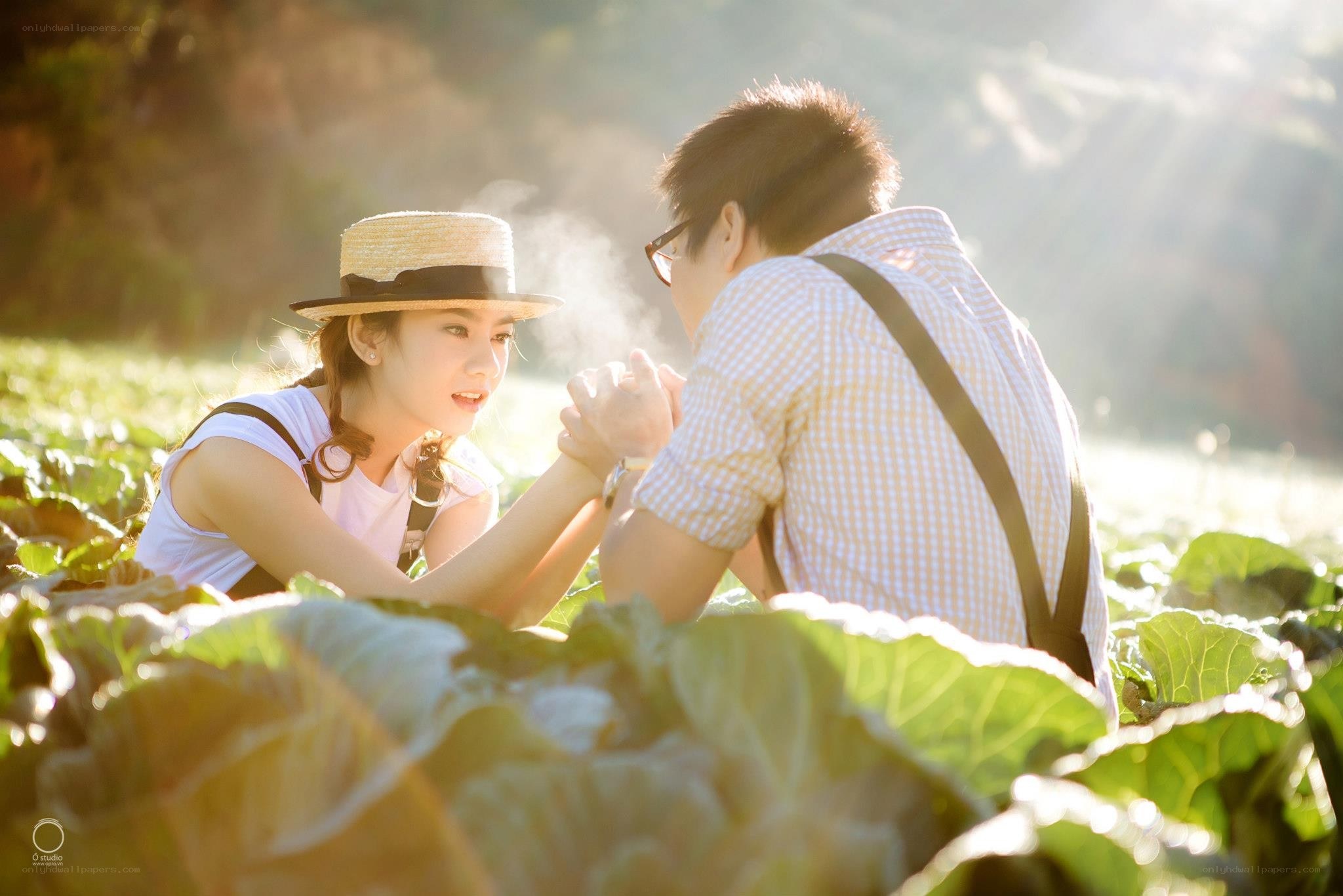 Couple in a cabbage field