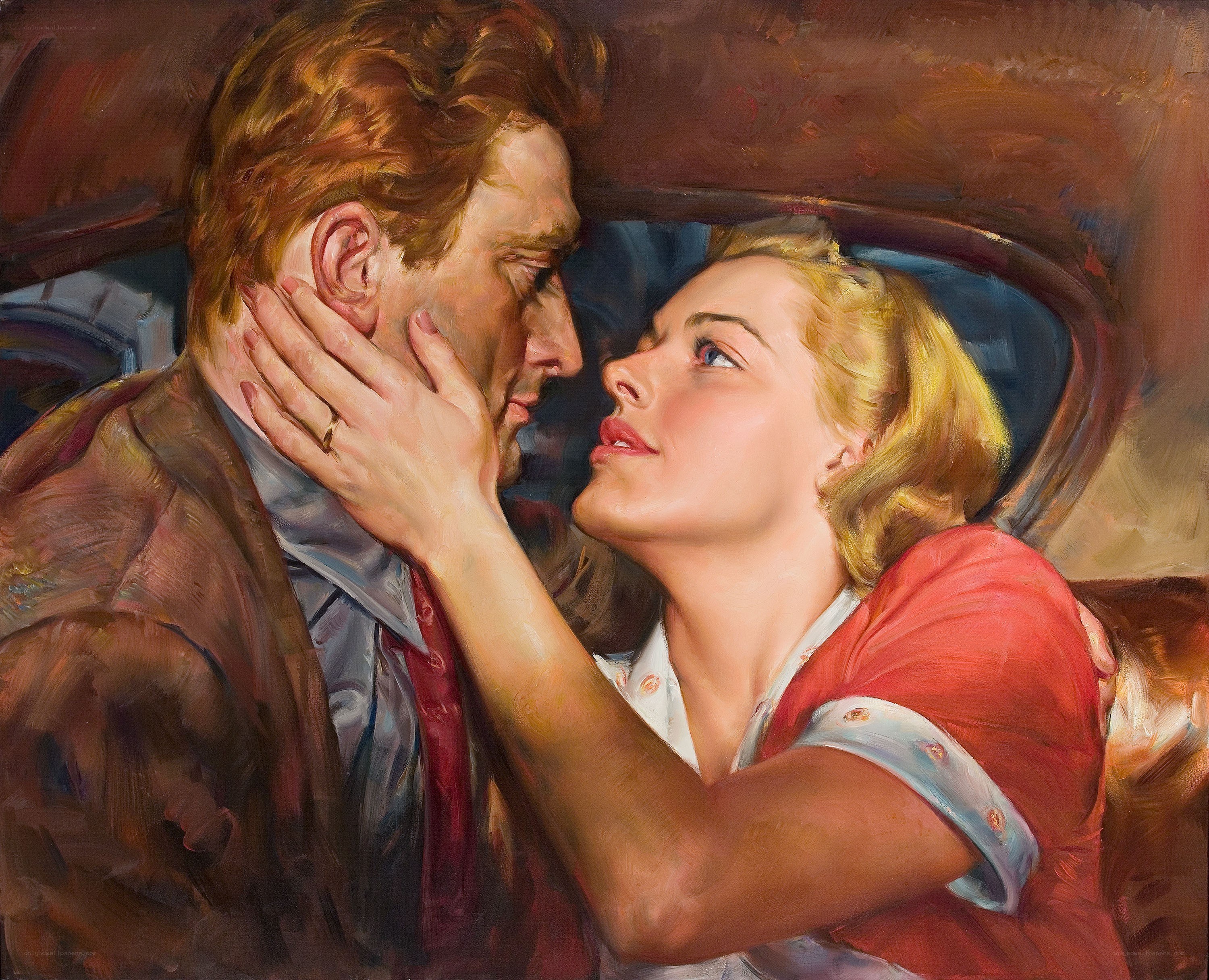 Couple in a car embrace