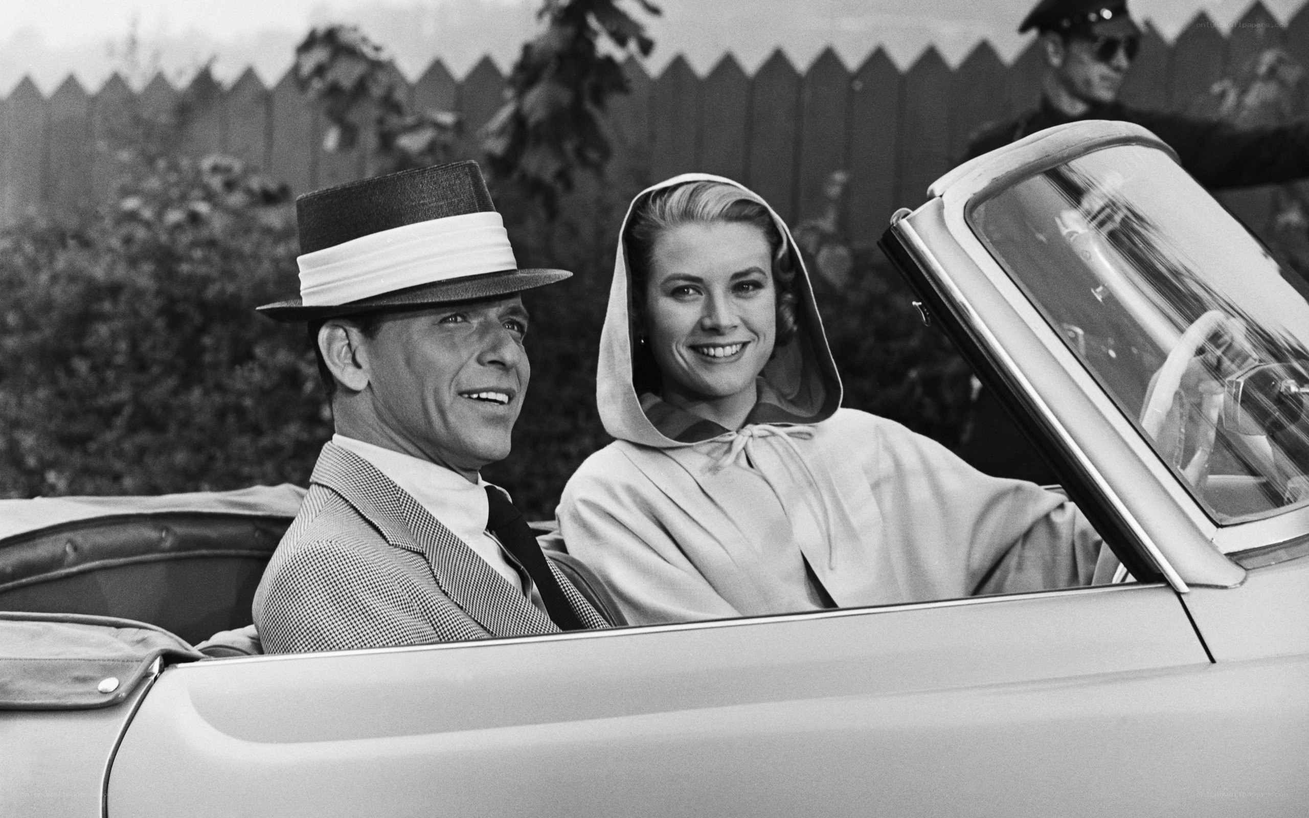 Couple in a convertible car